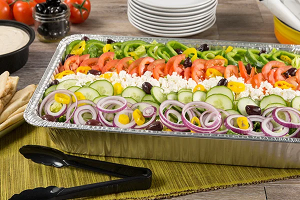 A plate of freshly prepared food on a table outdoors